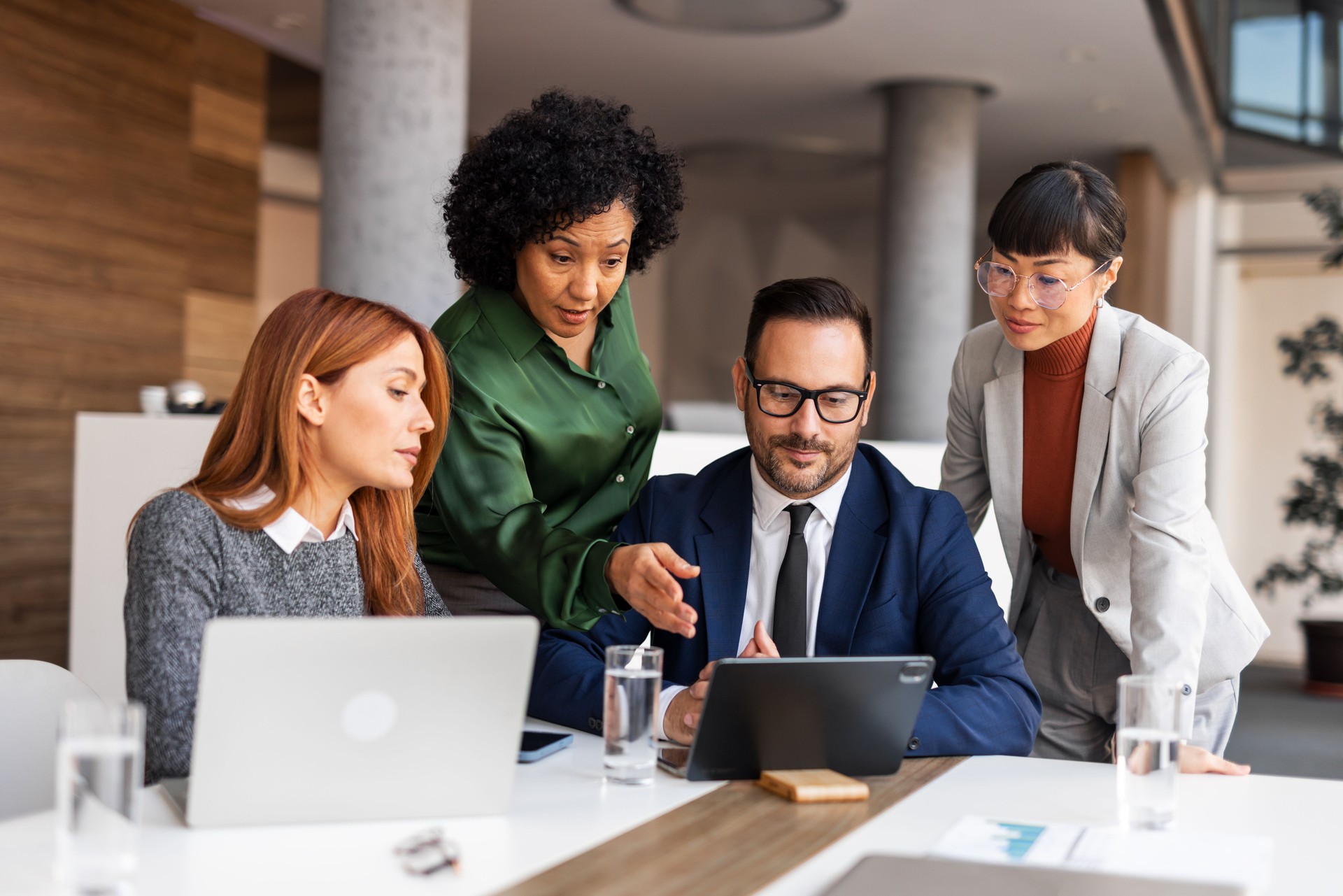 Team Collaboration Meeting in a Modern Office Setting